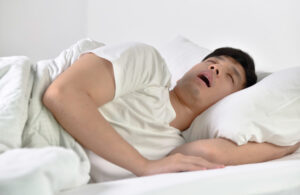 A man snoring while sleeping