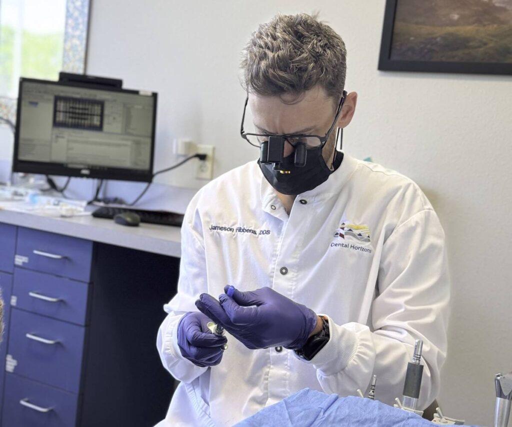 Dr. Jameson Ribbens providing dental care at Dental Horizons